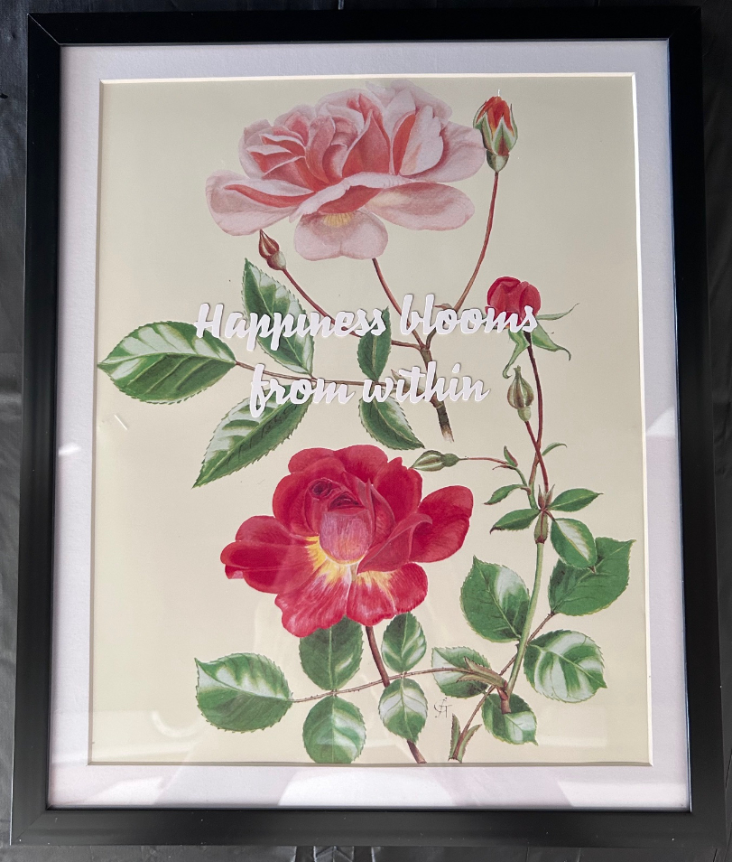 framed image of roses in pink and red with inspirational quote